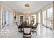 Spacious formal dining room with marble floors and large windows at 4601 N Legacy Dr, Muncie, IN 47304