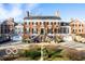 Grand brick manor house showcasing architectural details and landscaping at 4601 N Legacy Dr, Muncie, IN 47304