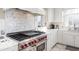 Modern kitchen with a high-end range and custom cabinetry at 4601 N Legacy Dr, Muncie, IN 47304