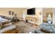 Cozy living room featuring a massage chair, ornate table, and comfortable seating at 4601 N Legacy Dr, Muncie, IN 47304