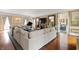 Elegant living room featuring a grand piano, fireplace, and plush oversized sectional at 4601 N Legacy Dr, Muncie, IN 47304