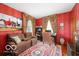 Home office with comfortable seating, and built in shelving at 4601 N Legacy Dr, Muncie, IN 47304