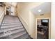 Brick staircase leading to the lower level with views into dining room at 4601 N Legacy Dr, Muncie, IN 47304