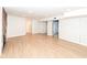 Spacious finished basement with multiple rooms and hardwood floors at 4621 E 37Th St, Indianapolis, IN 46218