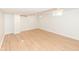 Finished basement room with hardwood floors and a window at 4621 E 37Th St, Indianapolis, IN 46218