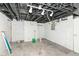 Unfinished basement with exposed utilities and concrete floor at 4621 E 37Th St, Indianapolis, IN 46218