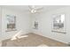 Spacious bedroom with ceiling fan and ample closet space at 4621 E 37Th St, Indianapolis, IN 46218
