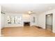 Bright living room featuring hardwood floors and a fireplace at 4621 E 37Th St, Indianapolis, IN 46218