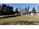 Charming blue two-story home with a spacious lawn and a detached garage at 5682 N Michigan Rd, Fairland, IN 46126