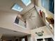 Entry way featuring natural light from skylights and a beautiful view of upper level at 5682 N Michigan Rd, Fairland, IN 46126