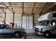 This large garage has enough space for both vehicles and storage at 5682 N Michigan Rd, Fairland, IN 46126