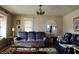 Comfortable living room with neutral walls, plush seating, and lots of natural light at 5682 N Michigan Rd, Fairland, IN 46126