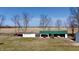 Spacious lot with a variety of outbuildings and sheds, offering abundant storage options at 5682 N Michigan Rd, Fairland, IN 46126