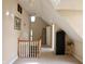 Spacious upstairs landing area with neutral walls and carpeted flooring at 5682 N Michigan Rd, Fairland, IN 46126