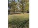 Spacious backyard with mature trees and picnic table at 7571 S County Road 825 E, Plainfield, IN 46168
