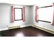 Spacious bedroom with hardwood floors and two windows at 7571 S County Road 825 E, Plainfield, IN 46168
