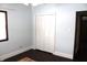 Bedroom with light blue walls and white closet at 7571 S County Road 825 E, Plainfield, IN 46168
