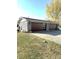Detached two-car garage with modern wood garage doors at 7571 S County Road 825 E, Plainfield, IN 46168