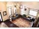 High-ceilinged living room with two sofas and a view of the entryway at 7571 S County Road 825 E, Plainfield, IN 46168