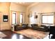 Spacious living room with hardwood floors, two sofas, and large windows at 7571 S County Road 825 E, Plainfield, IN 46168