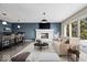 Finished basement with wet bar, fireplace, and walkout access at 10901 Brigantine Dr, Indianapolis, IN 46256