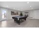 Game room with pool table and views to the lake at 10901 Brigantine Dr, Indianapolis, IN 46256