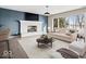 Spacious basement Gathering room featuring a fireplace and sliding glass doors at 10901 Brigantine Dr, Indianapolis, IN 46256