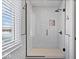 Clean bathroom with a walk-in shower and lake view at 10901 Brigantine Dr, Indianapolis, IN 46256