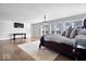 Spacious main bedroom with hardwood floors and a view at 10901 Brigantine Dr, Indianapolis, IN 46256