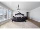 Main bedroom with large windows and hardwood floors at 10901 Brigantine Dr, Indianapolis, IN 46256