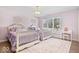 Charming bedroom with twin beds and soft decor at 10901 Brigantine Dr, Indianapolis, IN 46256