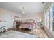 Spacious bedroom with lake view and elegant bedding at 10901 Brigantine Dr, Indianapolis, IN 46256
