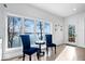 Bright breakfast room with lake views and comfortable seating for two at 10901 Brigantine Dr, Indianapolis, IN 46256