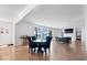 Formal dining room featuring hardwood floors and a view to the living room at 10901 Brigantine Dr, Indianapolis, IN 46256