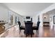 Elegant dining room with hardwood floors and a view of the living room at 10901 Brigantine Dr, Indianapolis, IN 46256