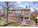 Beautiful brick home with a well-maintained lawn and terraced landscaping at 10901 Brigantine Dr, Indianapolis, IN 46256