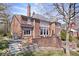 Spacious backyard featuring terraced landscaping and access to outdoor entertainment areas at 10901 Brigantine Dr, Indianapolis, IN 46256