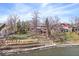 Brick house on a hill with waterfront views and access to the lake at 10901 Brigantine Dr, Indianapolis, IN 46256