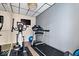 Well-equipped home gym featuring treadmill and elliptical at 10901 Brigantine Dr, Indianapolis, IN 46256