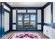 Bright home office with built-in shelves and a stunning lake view at 10901 Brigantine Dr, Indianapolis, IN 46256