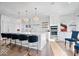 Spacious kitchen with white cabinets, quartz countertops, and gold accents at 10901 Brigantine Dr, Indianapolis, IN 46256