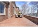 Brick patio offering stunning lake views and a perfect spot for outdoor relaxation at 10901 Brigantine Dr, Indianapolis, IN 46256