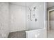 Large walk-in shower with marble tile and glass enclosure at 10901 Brigantine Dr, Indianapolis, IN 46256