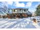 Deck with seating area overlooks snowy backyard at 125 Chalet Dr, Mooresville, IN 46158