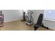 Home gym featuring workout equipment, hard wood floors, and natural light at 1271 Clairet Dr, Westfield, IN 46074