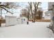 Snowy backyard with shed and privacy fence at 1430 St Paul St, Indianapolis, IN 46203
