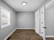 Bright bedroom featuring a window and wood-look floors at 1430 St Paul St, Indianapolis, IN 46203