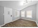 Bright entryway with gray walls, wood floors, and white door at 1430 St Paul St, Indianapolis, IN 46203