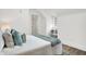 Bright bedroom with ensuite bathroom and hardwood floors at 1745 S Talbott St, Indianapolis, IN 46225