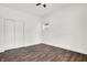 Clean bedroom with hardwood floors and ceiling fan at 1745 S Talbott St, Indianapolis, IN 46225